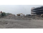 Fire Damaged Structural Steel, GI Sheets and Reinforcement Steel embedded in Cement Concrete with Approx. total weight of 750 MT