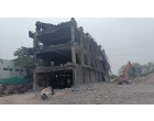 Fire Damaged Structural Steel, GI Sheets and Reinforcement Steel embedded in Cement Concrete with Approx. total weight of 750 MT