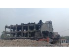 Fire Damaged Structural Steel, GI Sheets and Reinforcement Steel embedded in Cement Concrete with Approx. total weight of 750 MT