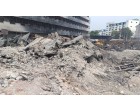 Fire Damaged Structural Steel, GI Sheets and Reinforcement Steel embedded in Cement Concrete with Approx. total weight of 750 MT